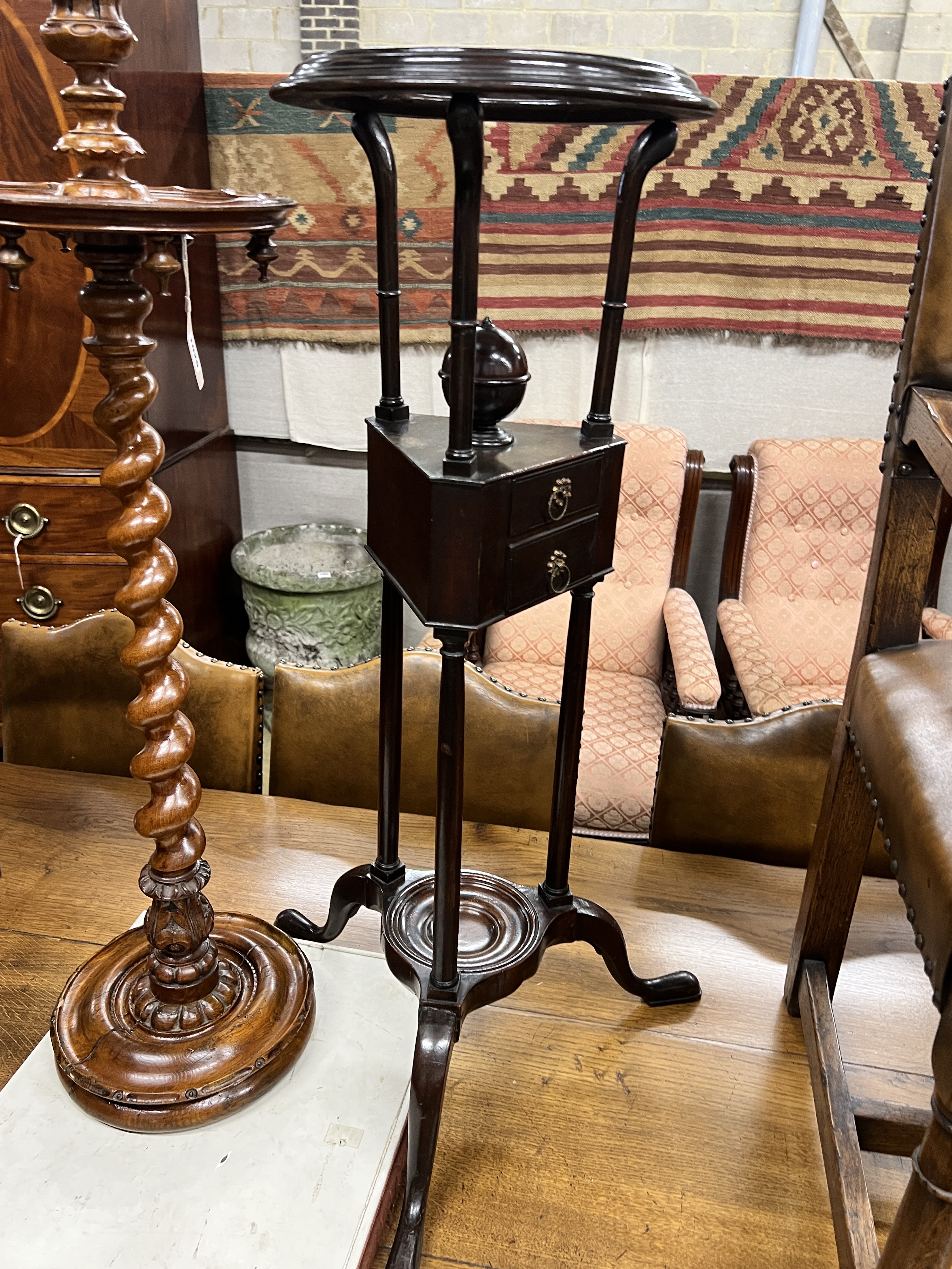 An early 20th century carved oak candle stand together with a mahogany washstand, larger height 91cm